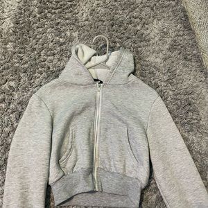 cropped zip up